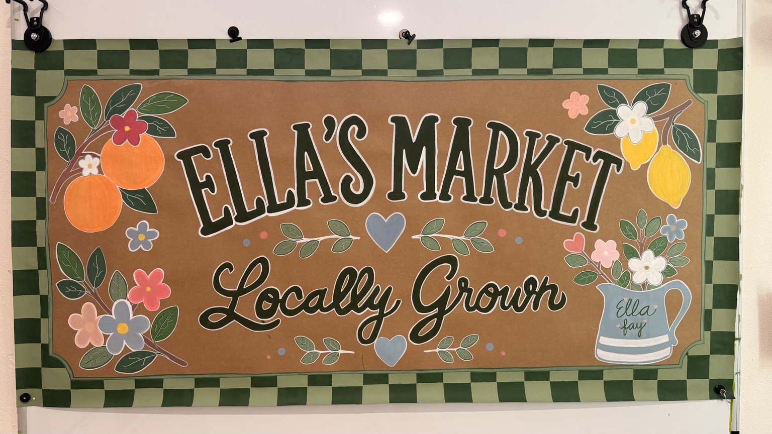 Hand-painted Ella's Market banner